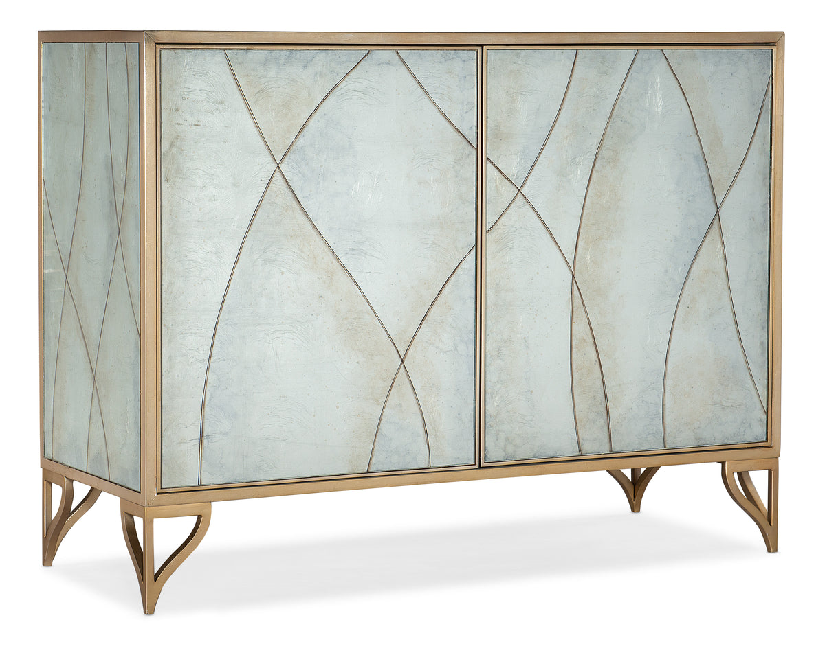a white and gold cabinet