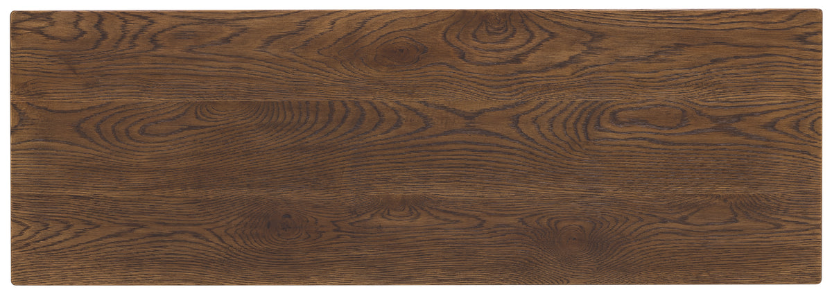 a close up of a wood with Nazca Lines in the background