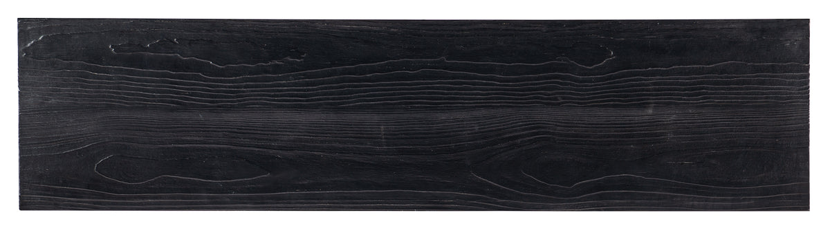 a black wood grained surface