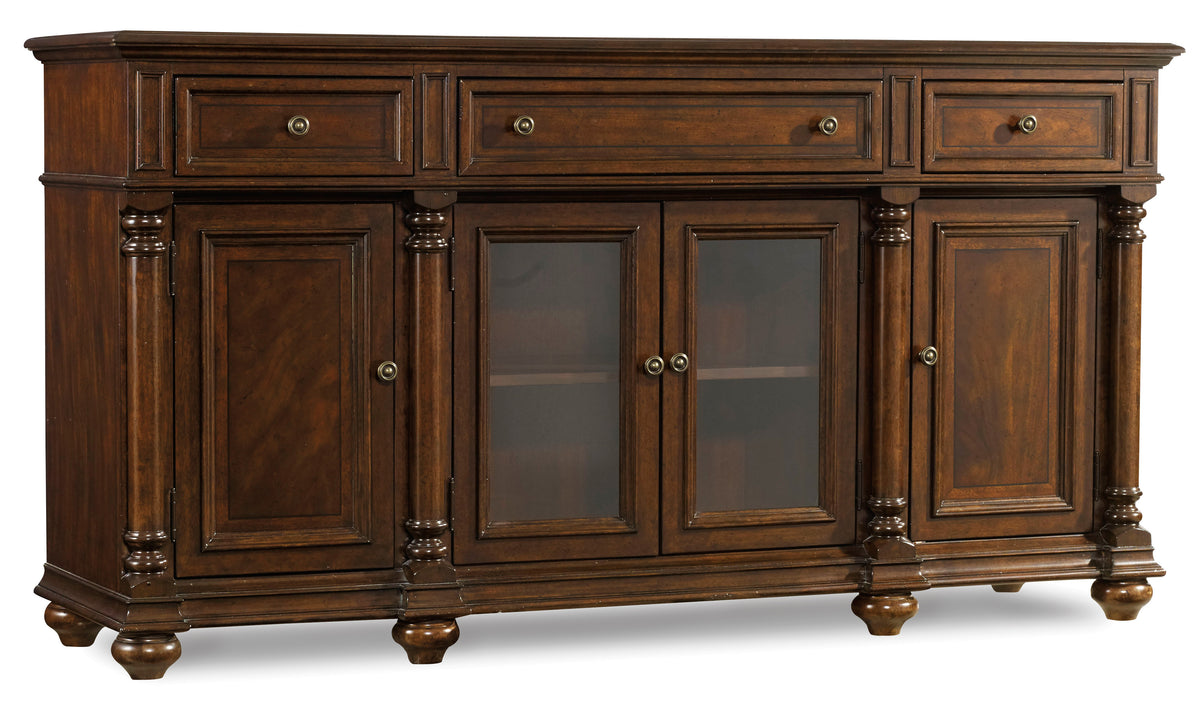 a brown wooden cabinet with glass doors