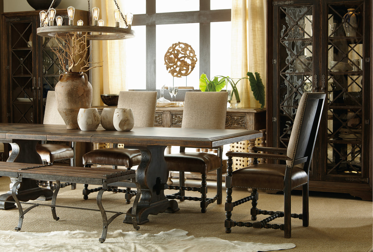 a dining room with a table and chairs