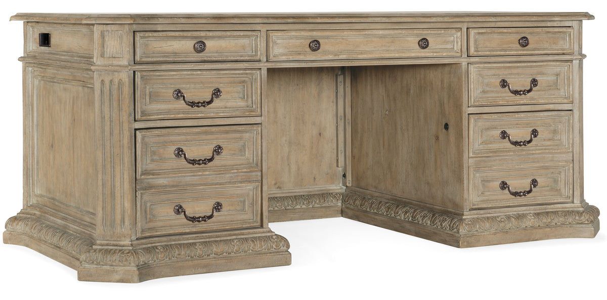 a wooden desk with drawers