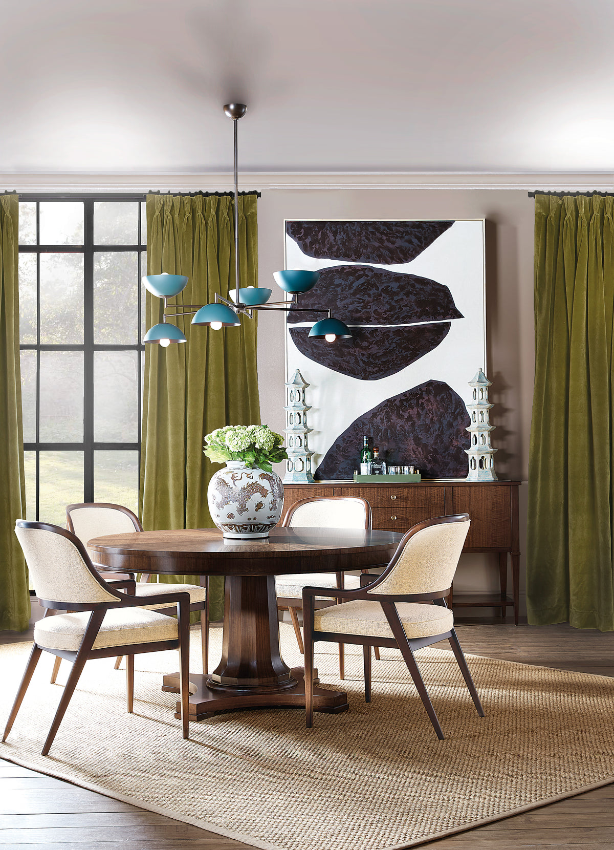 a dining room with a table and chairs