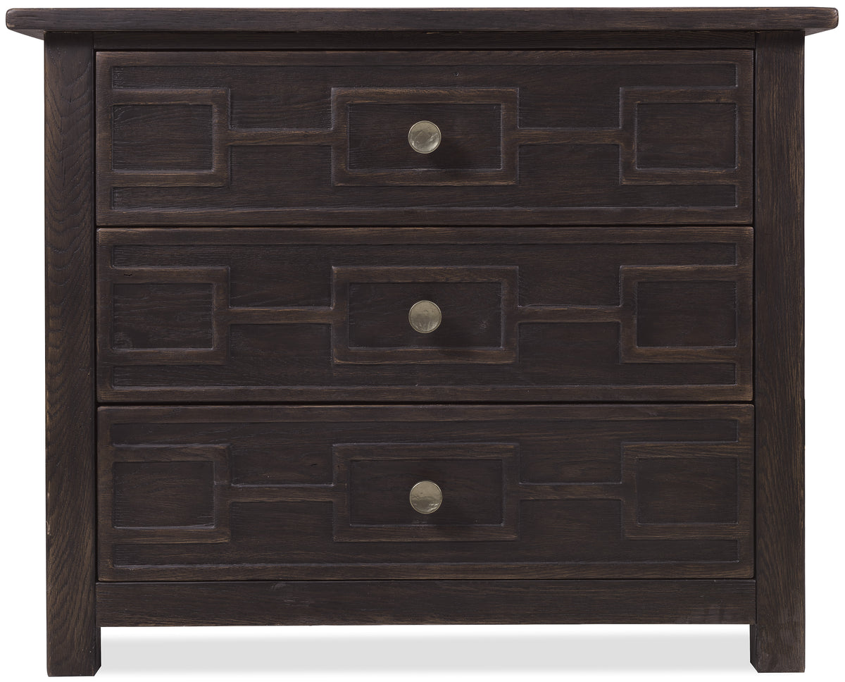 a dark wood dresser with three drawers