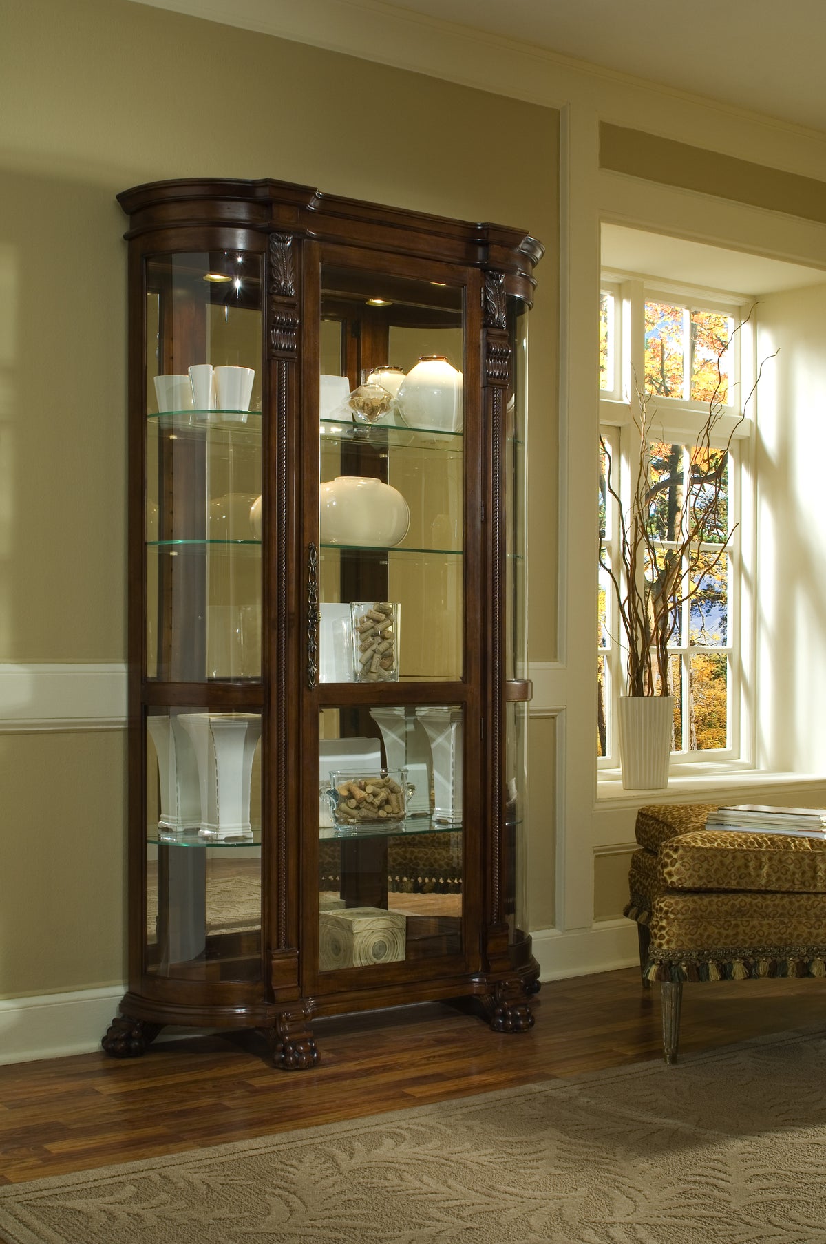 a glass cabinet with shelves