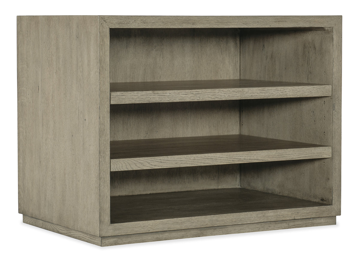 a wooden shelf with shelves