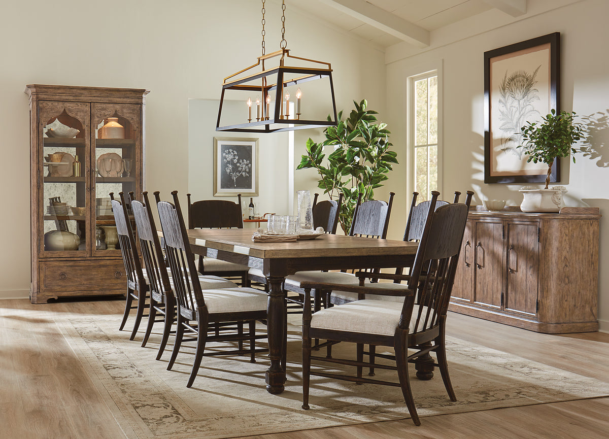 a dining room with a table and chairs