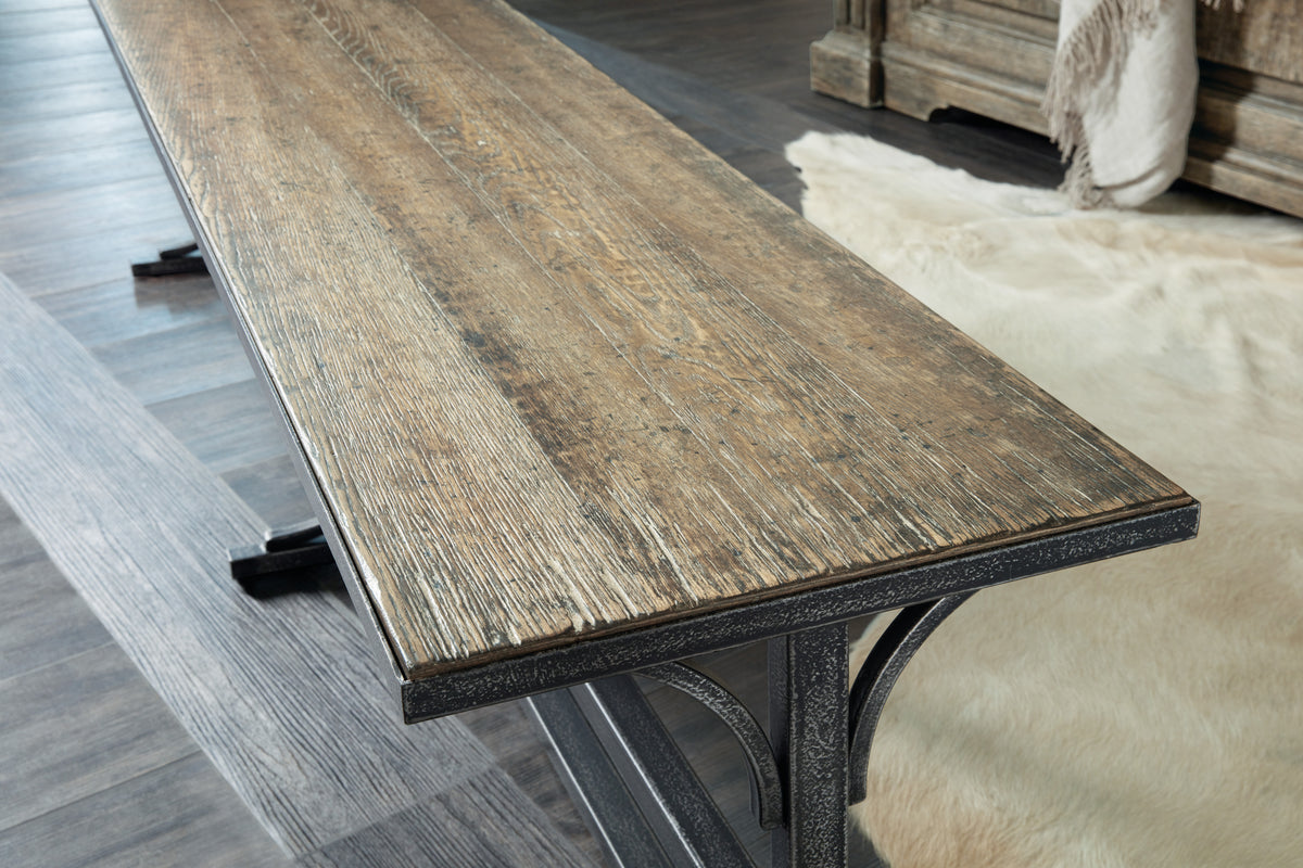 a wood table with metal legs