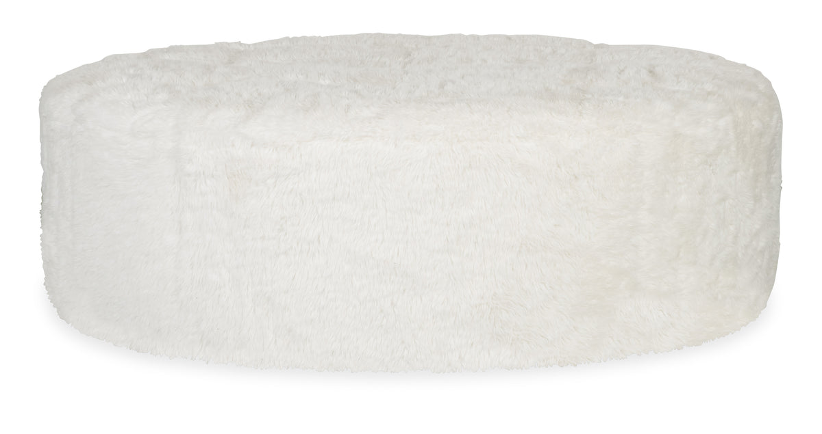 a white fluffy rug on a white background