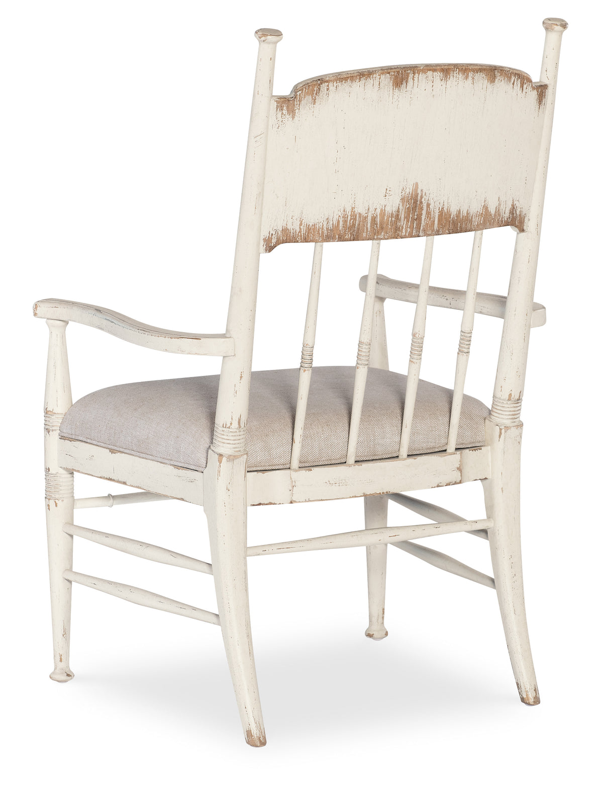 a white chair with a cushion