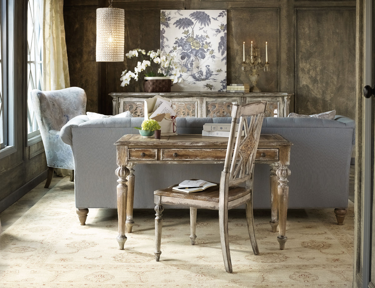 a room with a table and chairs
