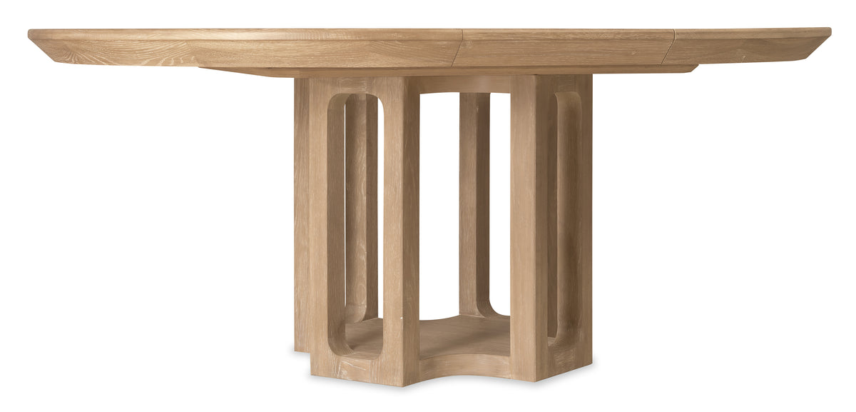 a wooden table with a round top