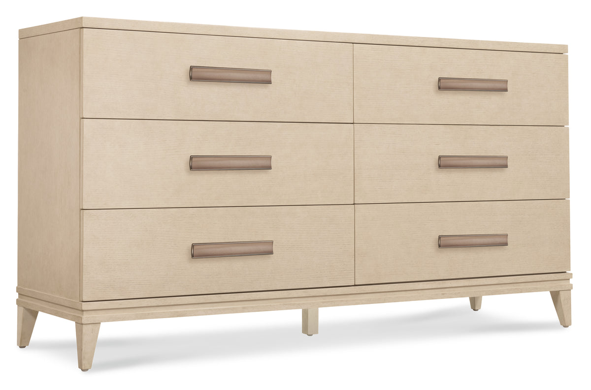 a white dresser with drawers