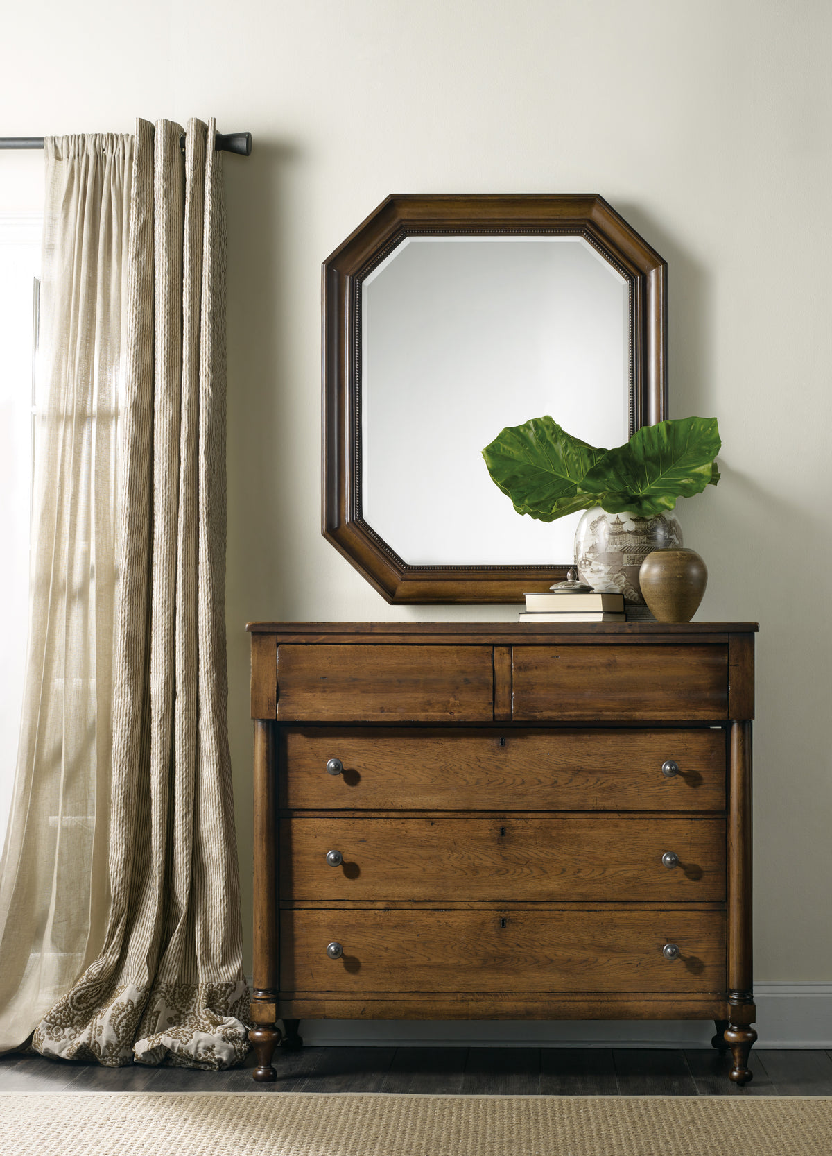 a mirror on a dresser