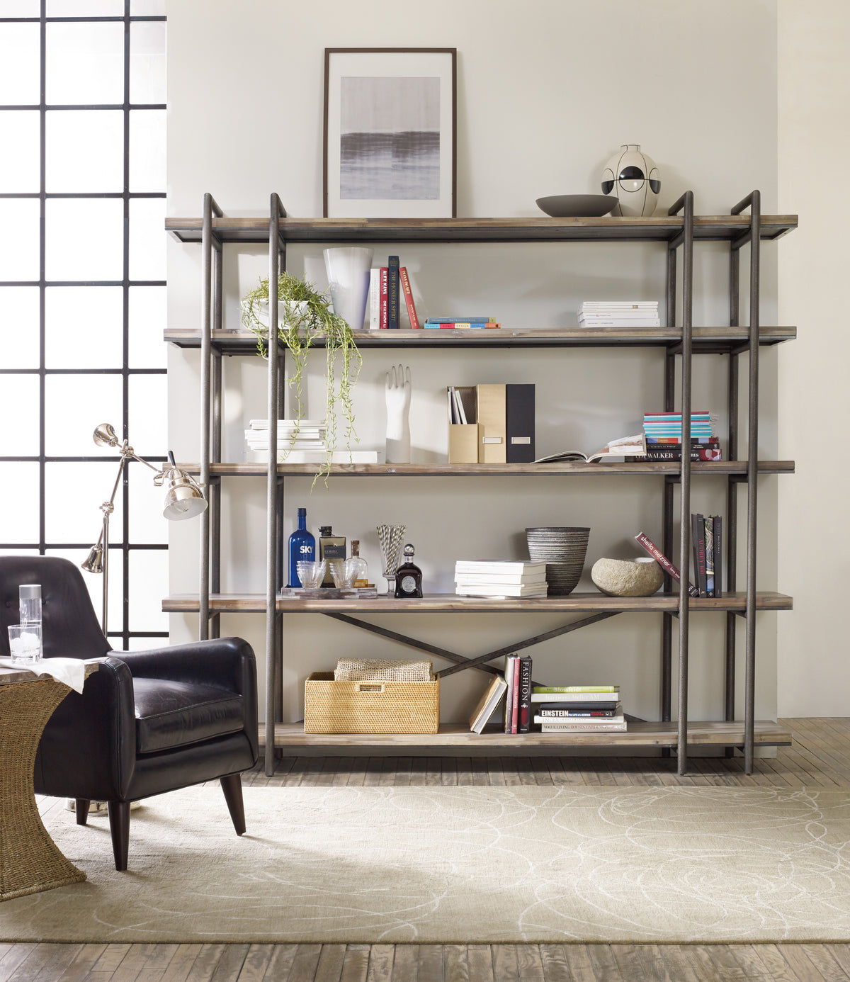 a shelf with books and objects on it