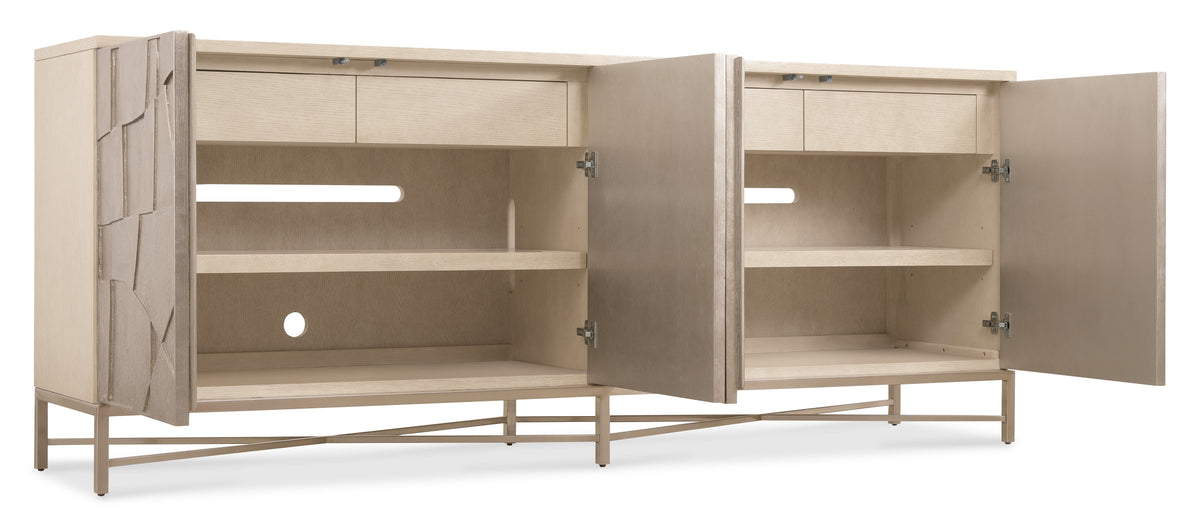 a white cabinet with open shelves