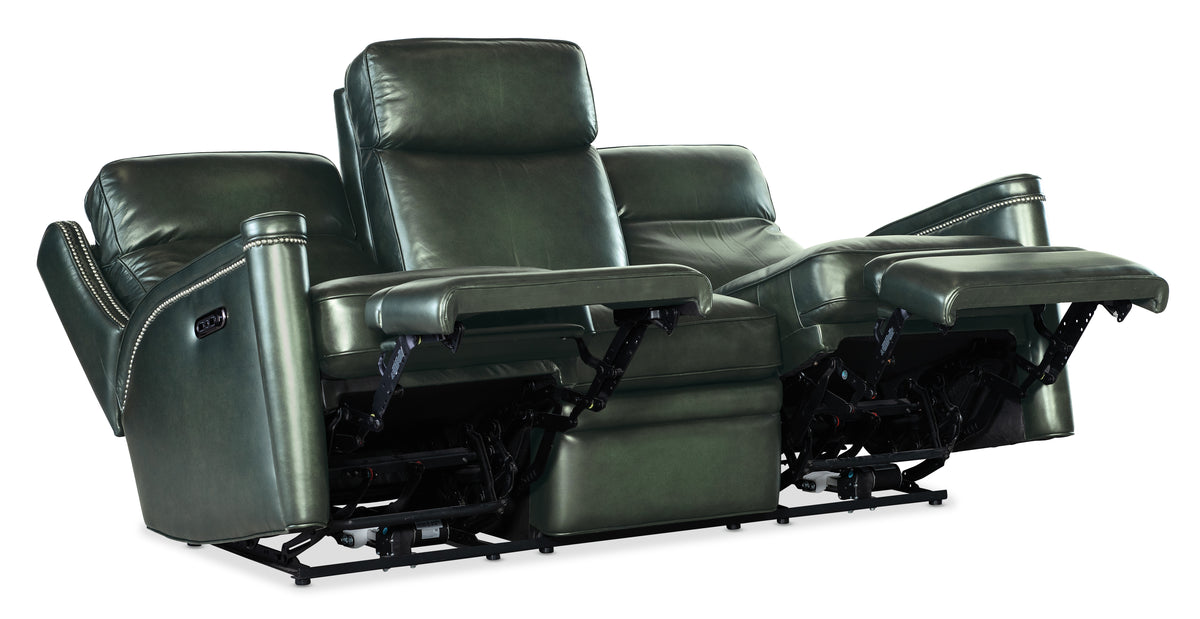 a group of green leather chairs
