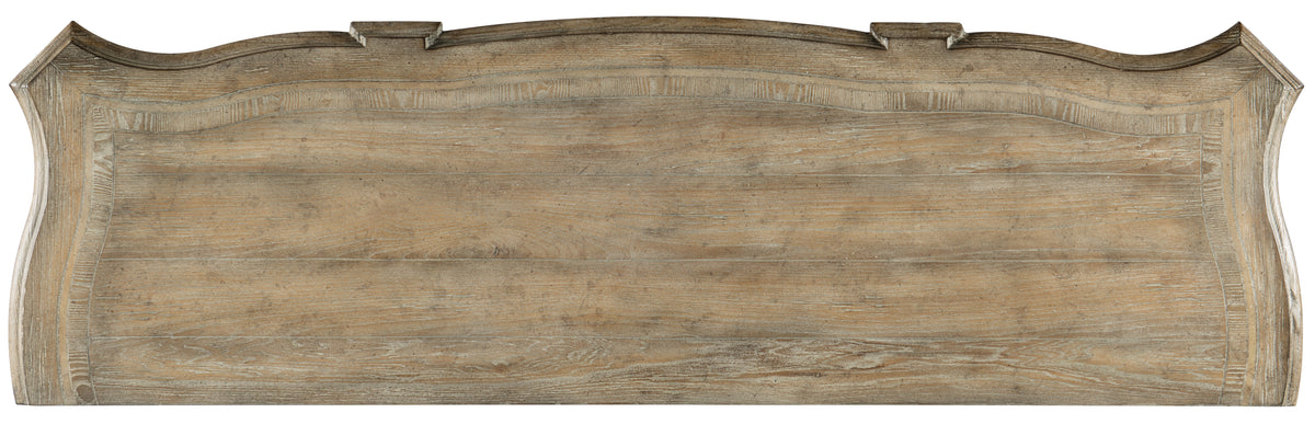 a wooden board with a curved edge