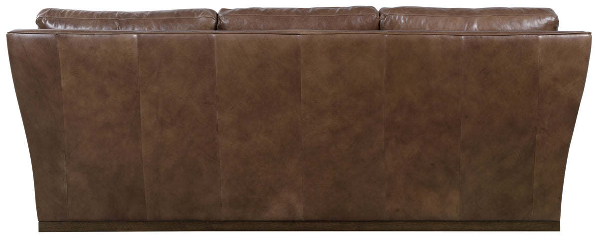 the back of a brown leather couch