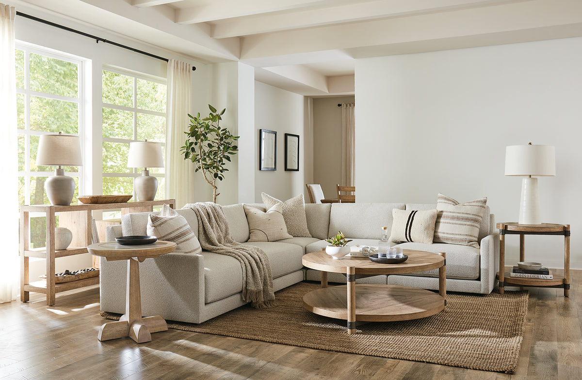 a living room with a large couch and a coffee table