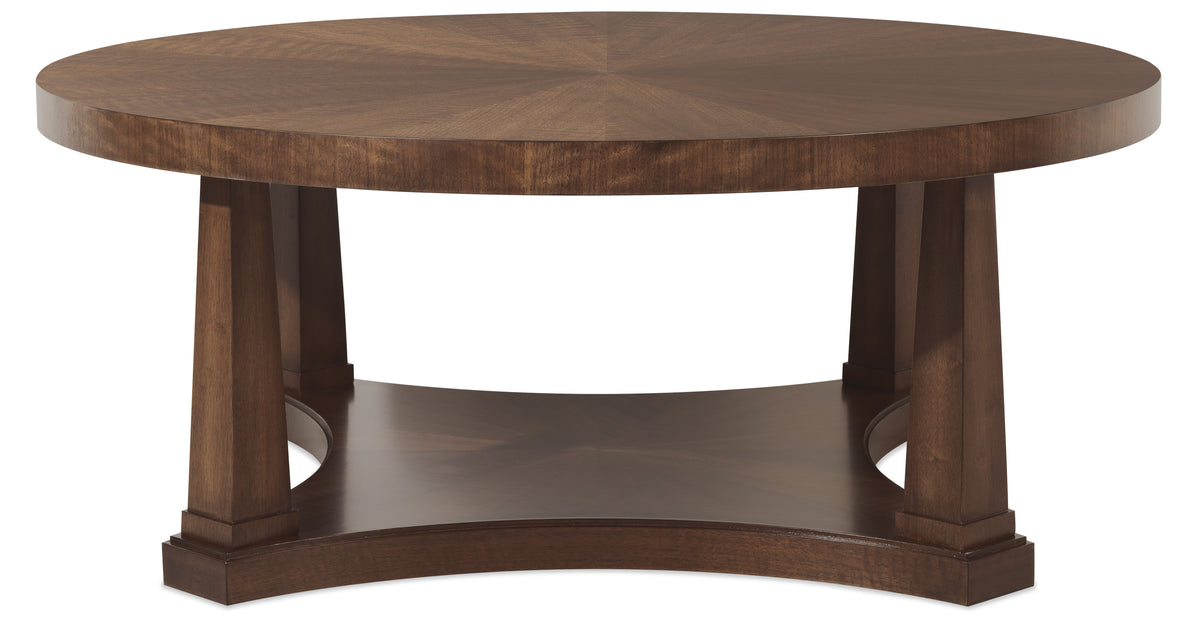 a brown round table with a shelf