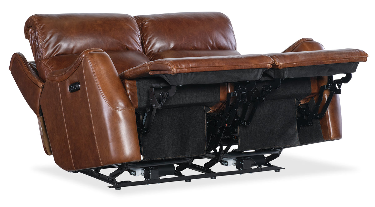 a brown leather recliner with black legs