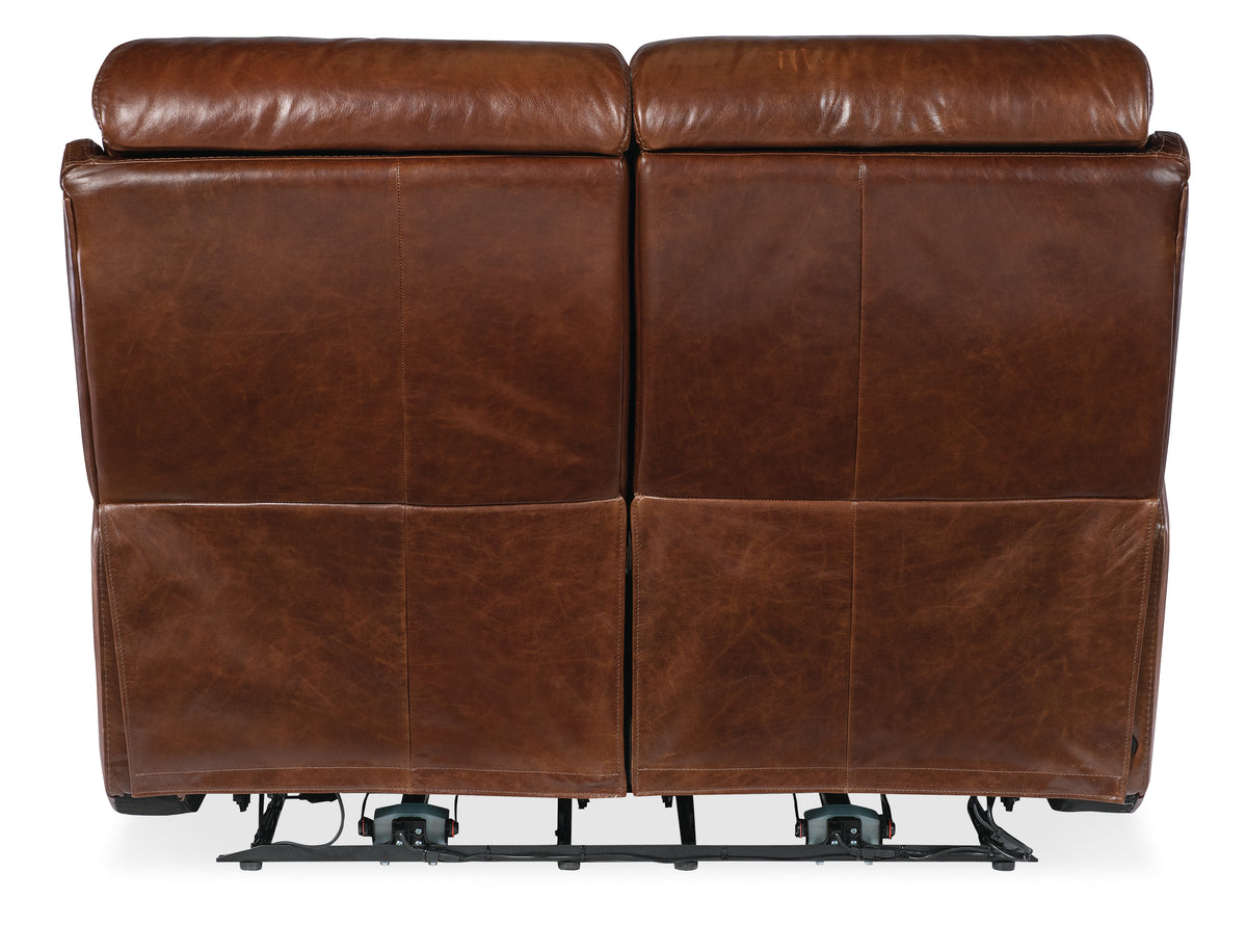 a back of a brown leather couch