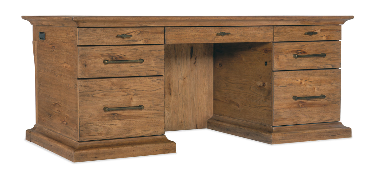 a wooden desk with drawers