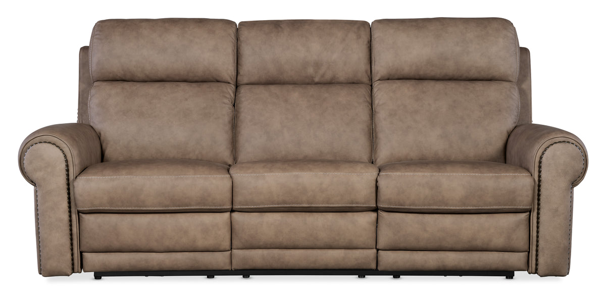 a brown leather couch with a white background