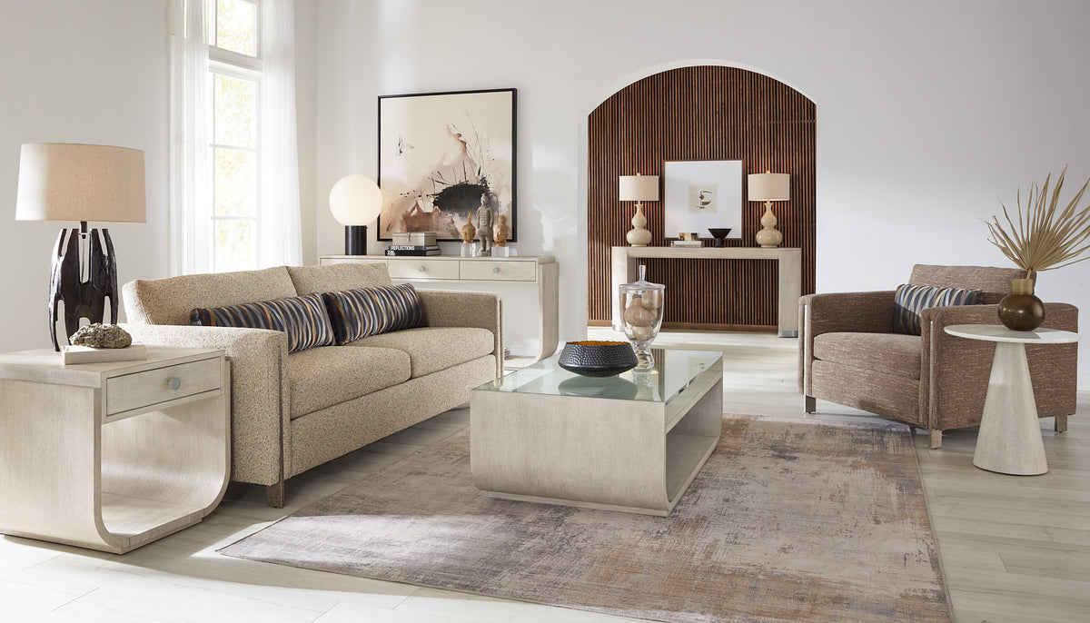 a living room with a couch and a coffee table