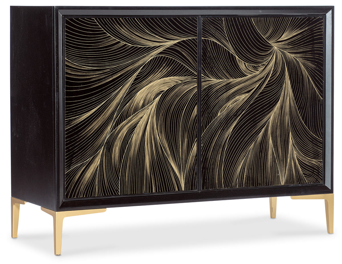 a black cabinet with gold designs